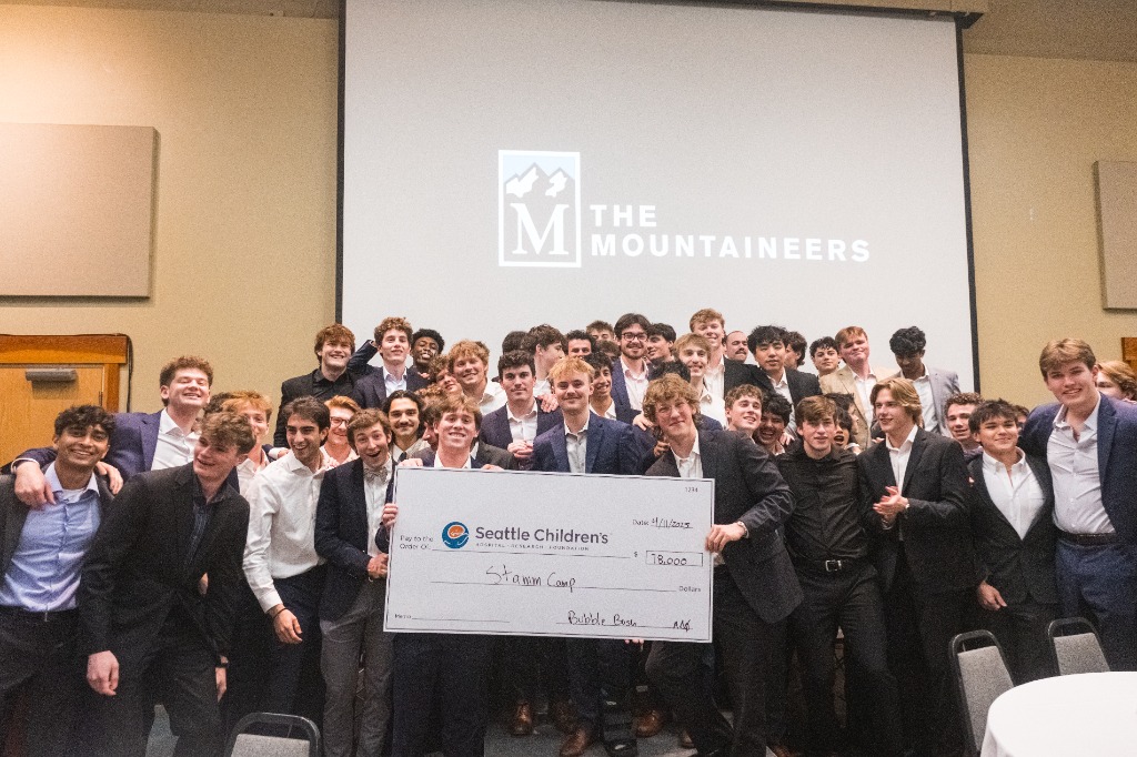 Bubble Bash Guild presenting a check to Seattle Children's